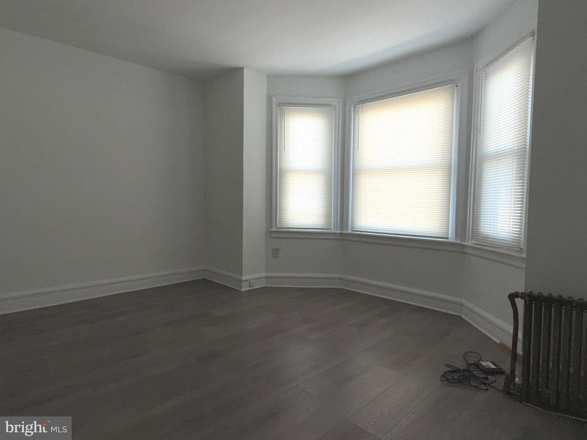 5756 Hunter Street Philadelphia, PA 19131 - Photo 14 of 16 an empty room with a window