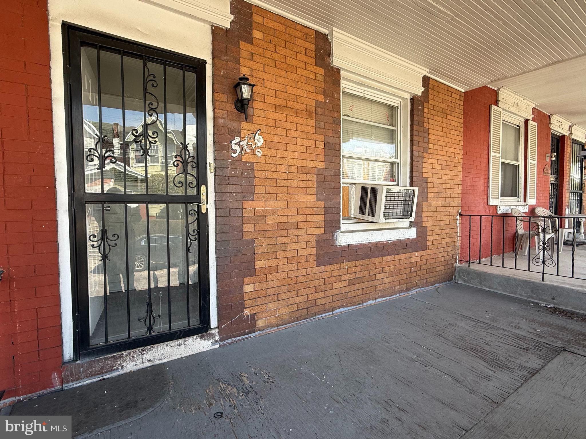 5756 Hunter Street Philadelphia, PA 19131 - Photo 3 of 16 a view of a brick house with an outdoor space