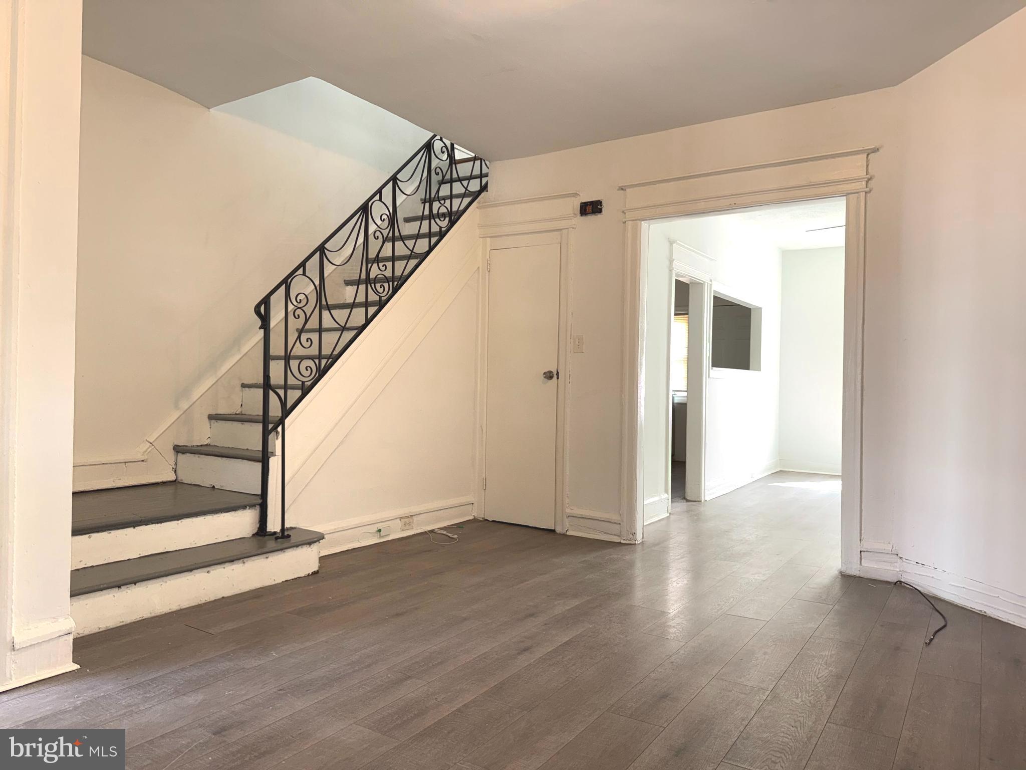 5756 Hunter Street Philadelphia, PA 19131 - Photo 5 of 16 a view of an entryway with wooden floor