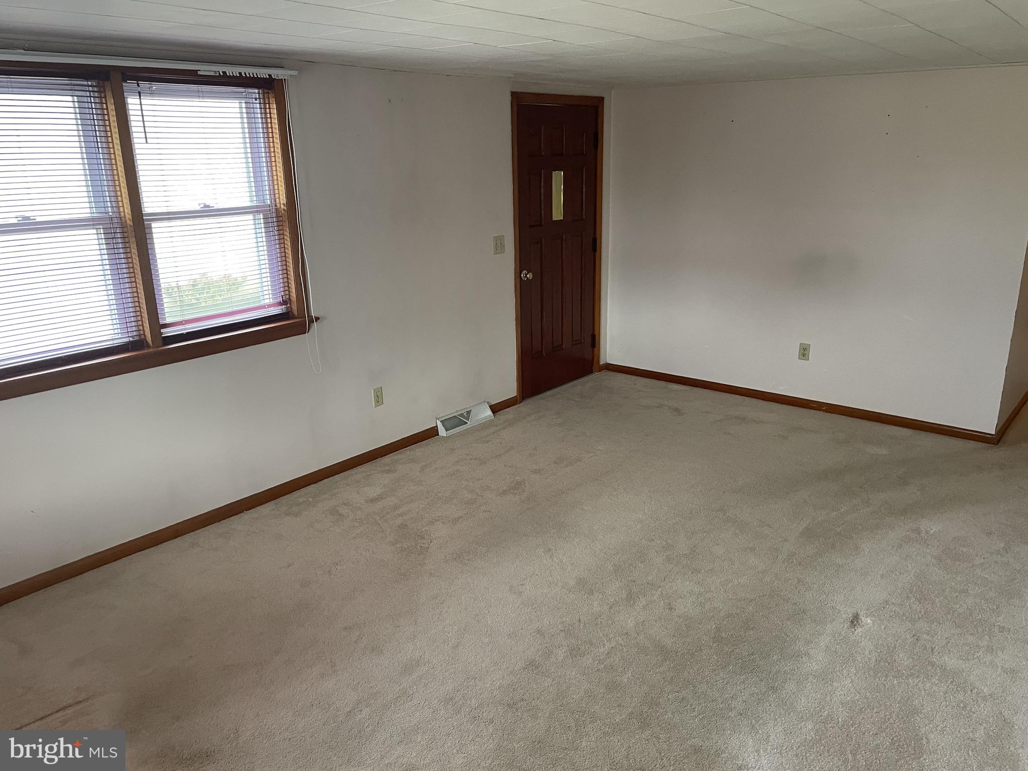 4420 West Denneys Road Dover, DE 19904 - Photo 21 of 36 an empty room with windows