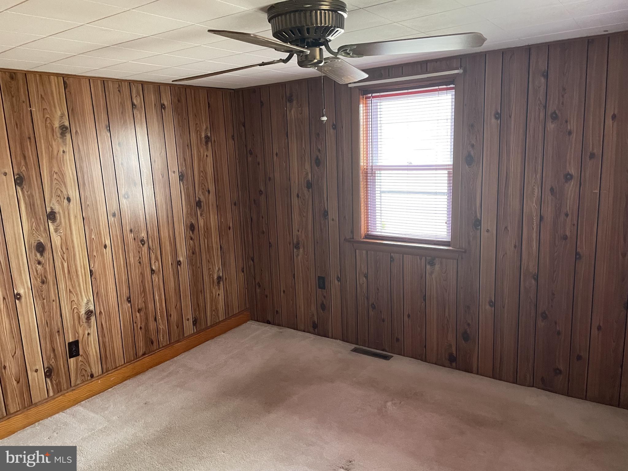 4420 West Denneys Road Dover, DE 19904 - Photo 24 of 36 a view of an empty room with a window