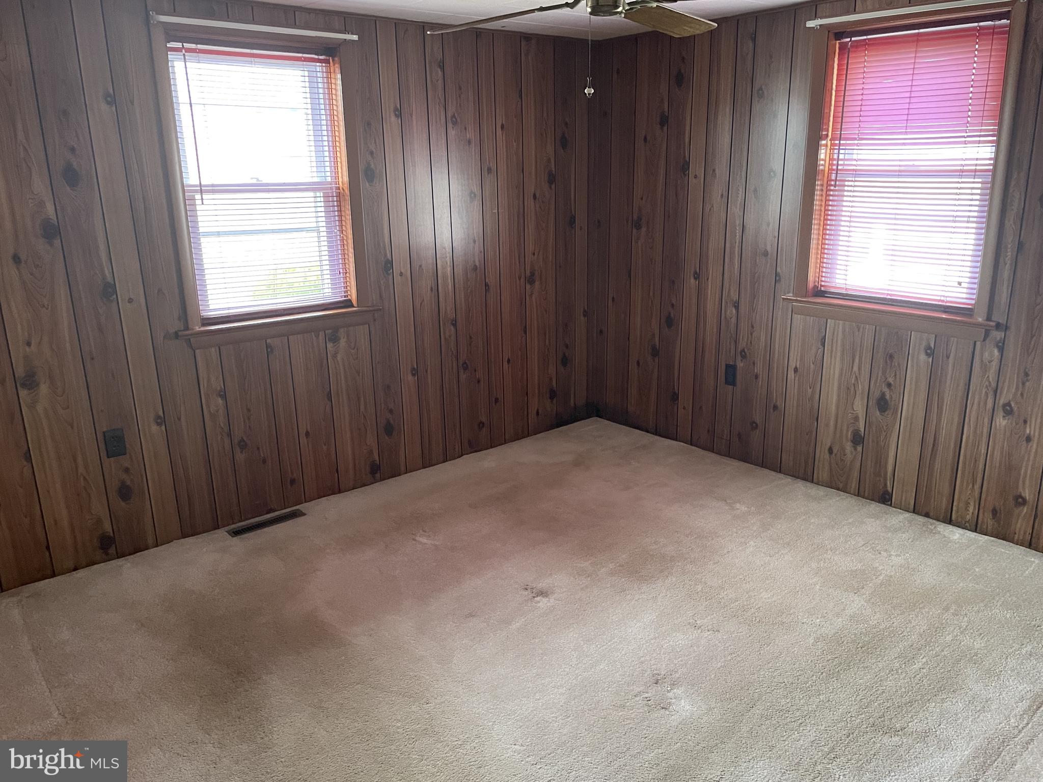 4420 West Denneys Road Dover, DE 19904 - Photo 25 of 36 an empty room with windows