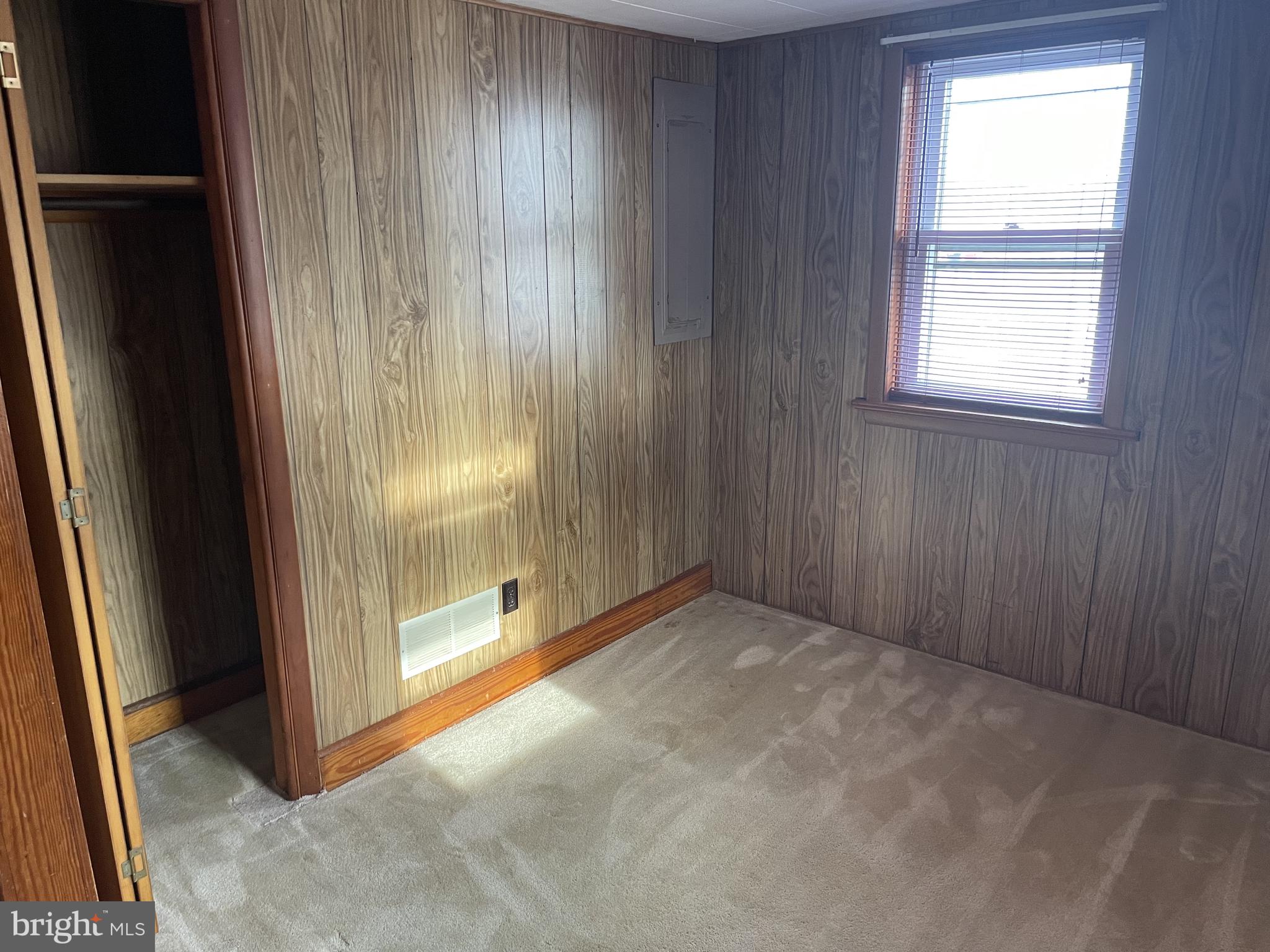 4420 West Denneys Road Dover, DE 19904 - Photo 26 of 36 an empty room with windows