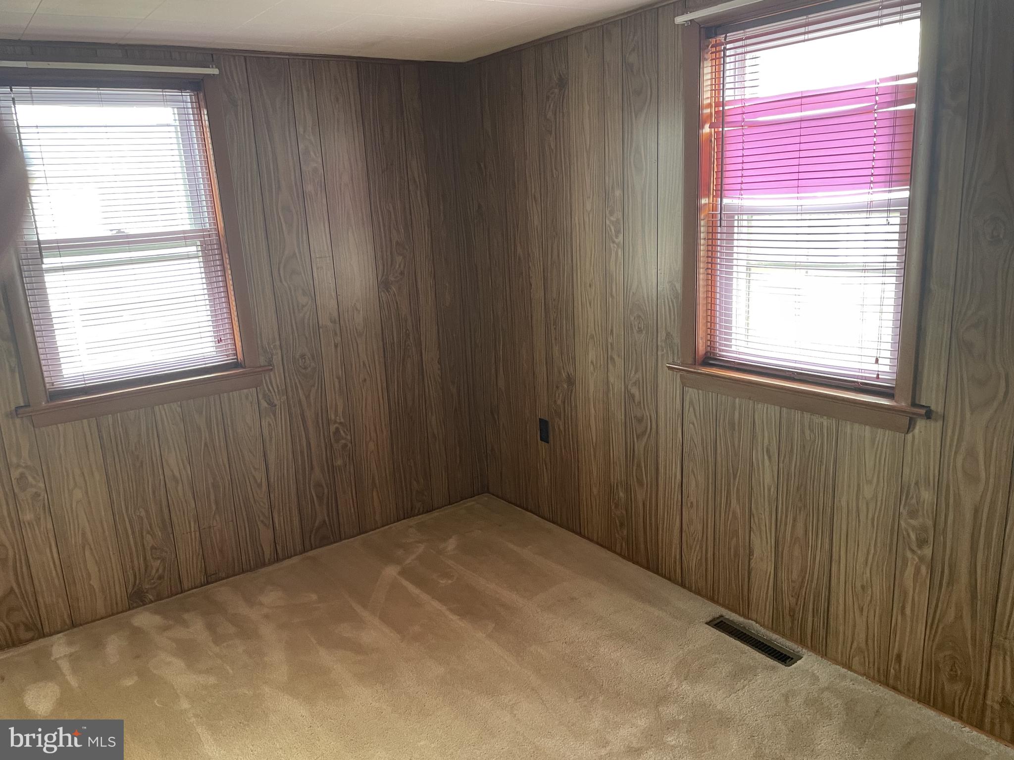 4420 West Denneys Road Dover, DE 19904 - Photo 27 of 36 a view of an empty room with a window