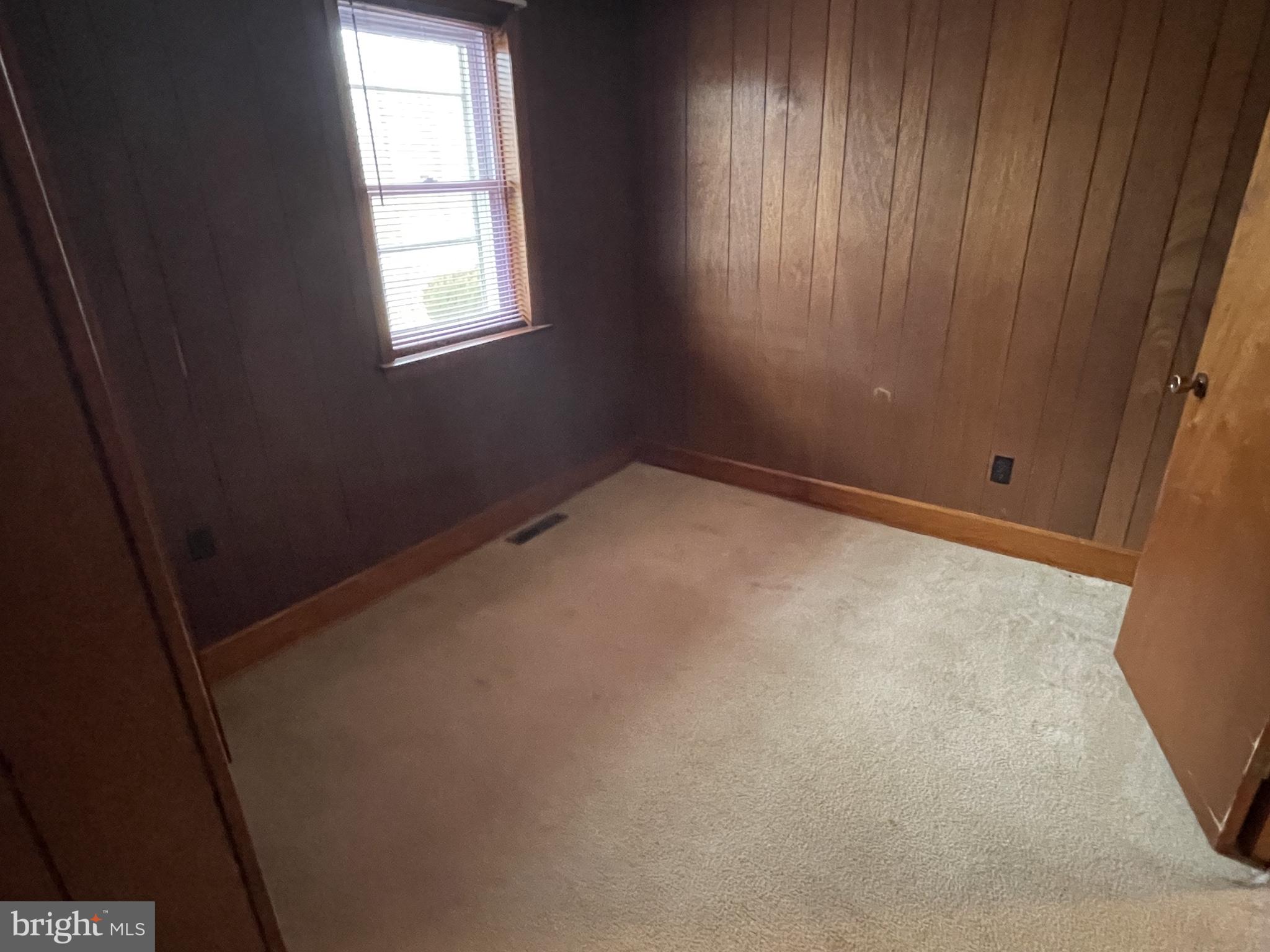 4420 West Denneys Road Dover, DE 19904 - Photo 28 of 36 an empty room with windows