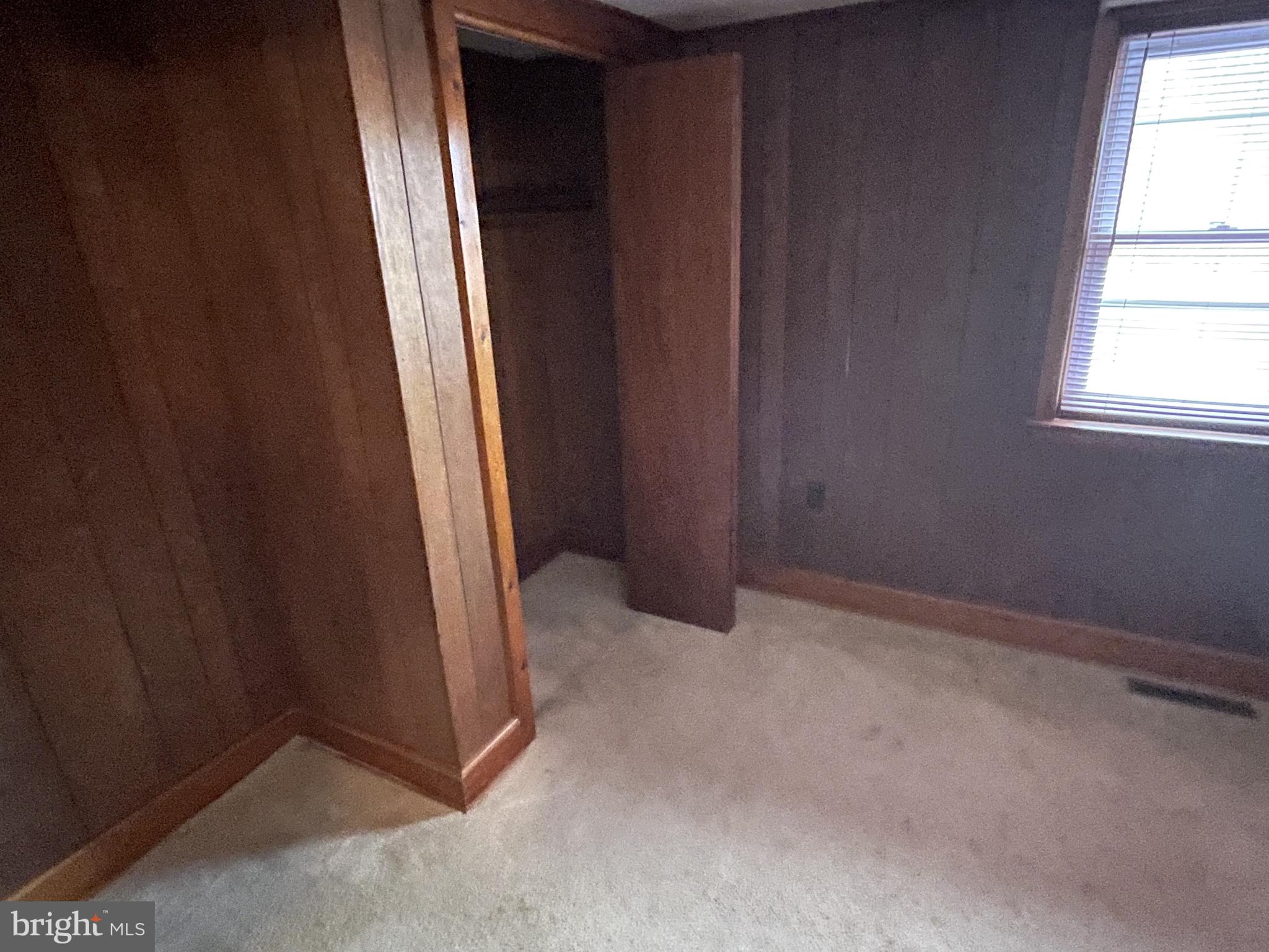 4420 West Denneys Road Dover, DE 19904 - Photo 29 of 36 an empty room with windows