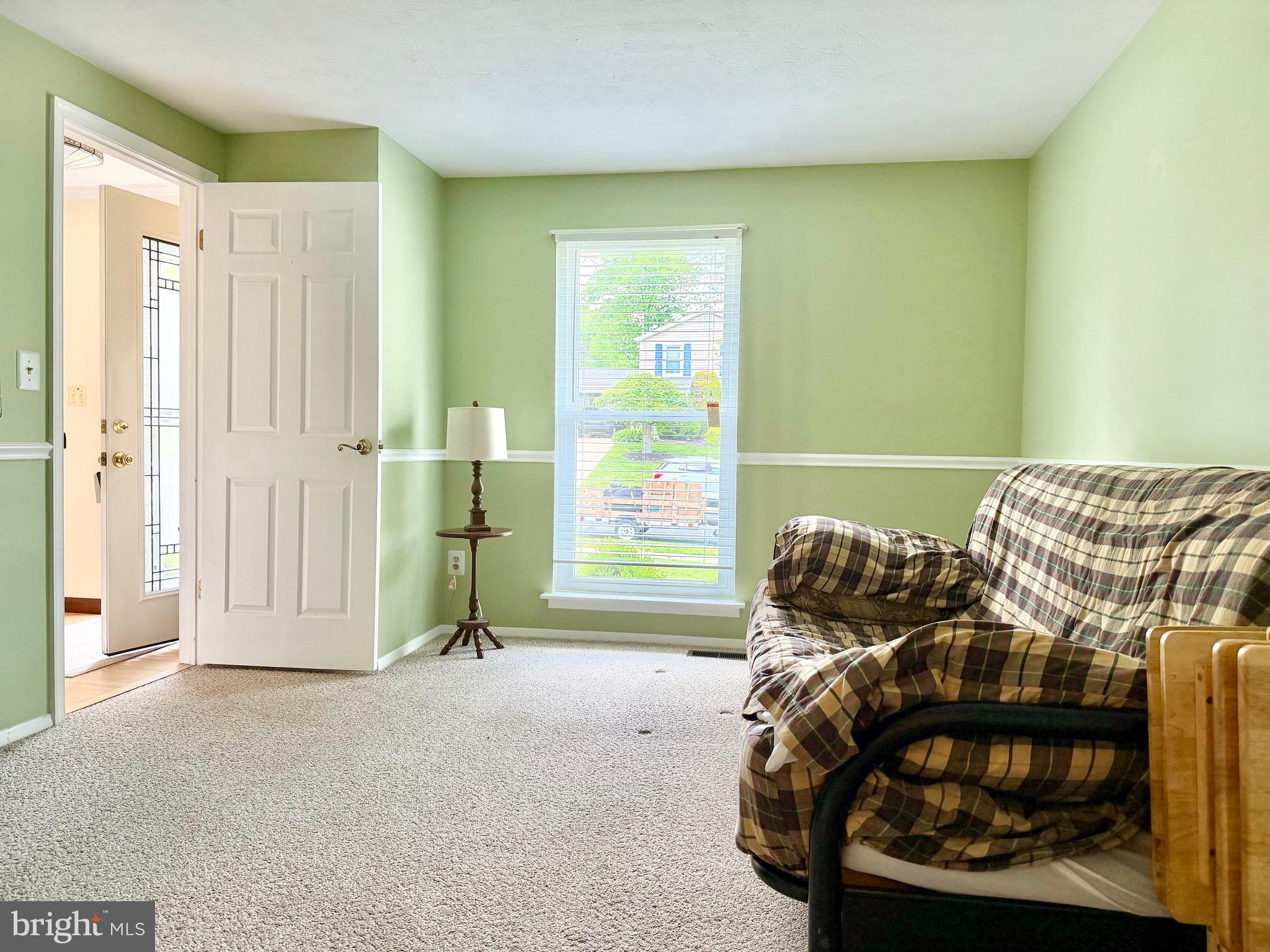 2712 Parallel Path Abingdon, MD 21009 - Photo 15 of 37 a living room with furniture and a window