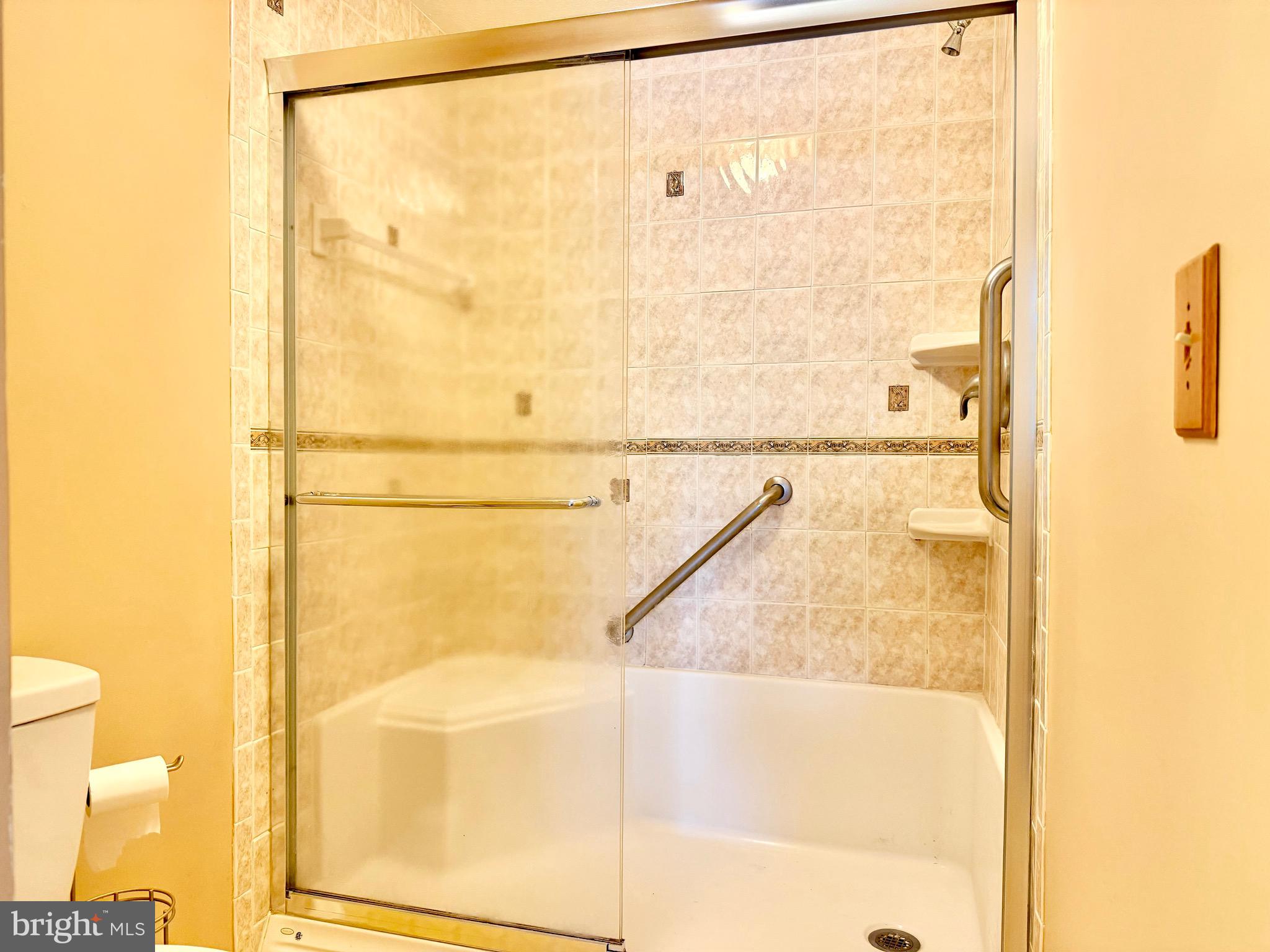 2712 Parallel Path Abingdon, MD 21009 - Photo 18 of 37 a bathroom with a glass shower door