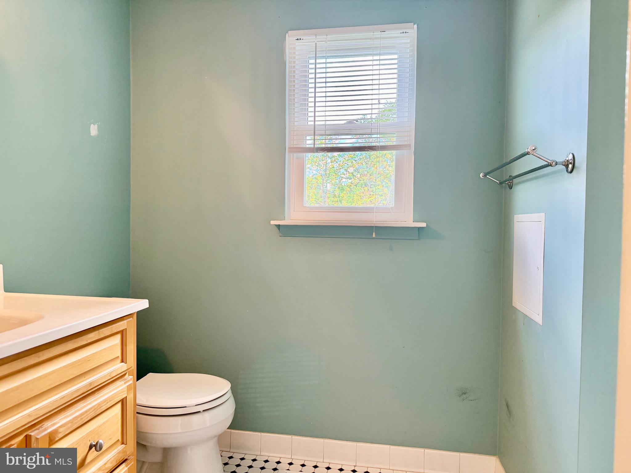 2712 Parallel Path Abingdon, MD 21009 - Photo 25 of 37 a white toilet sitting next to a bathroom sink