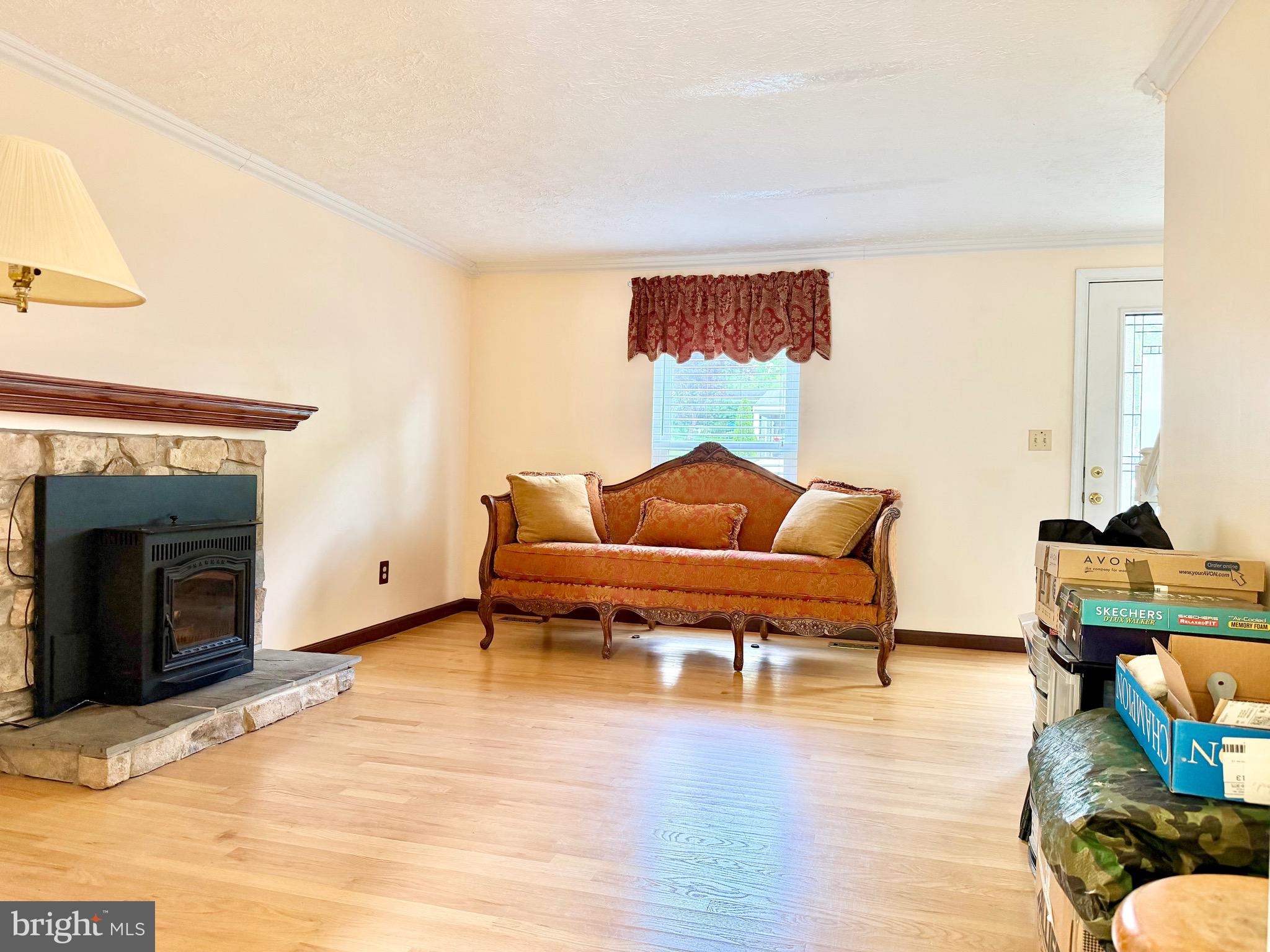2712 Parallel Path Abingdon, MD 21009 - Photo 6 of 37 a living room with furniture and a fireplace