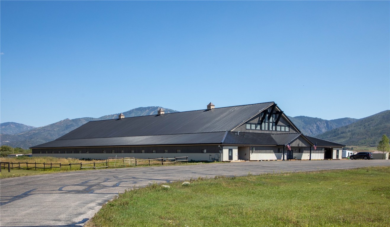 30700 Marshall Ridge Steamboat Springs, CO 80487 - Photo 6 of 21 a front view of a house with a garden