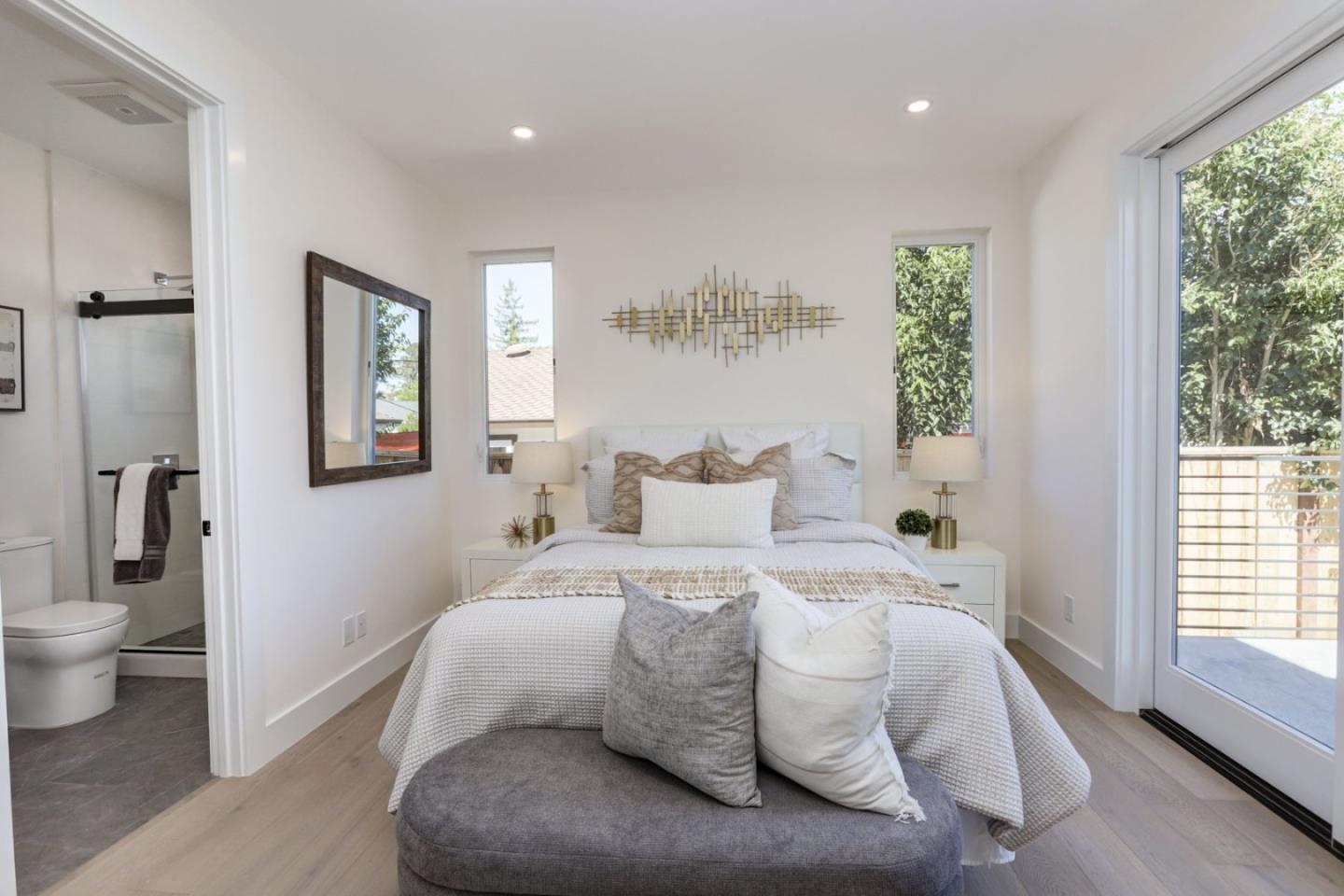 3107 Greer Road Palo Alto, CA 94303 - Photo 13 of 20 a spacious bedroom with a bed and a large window