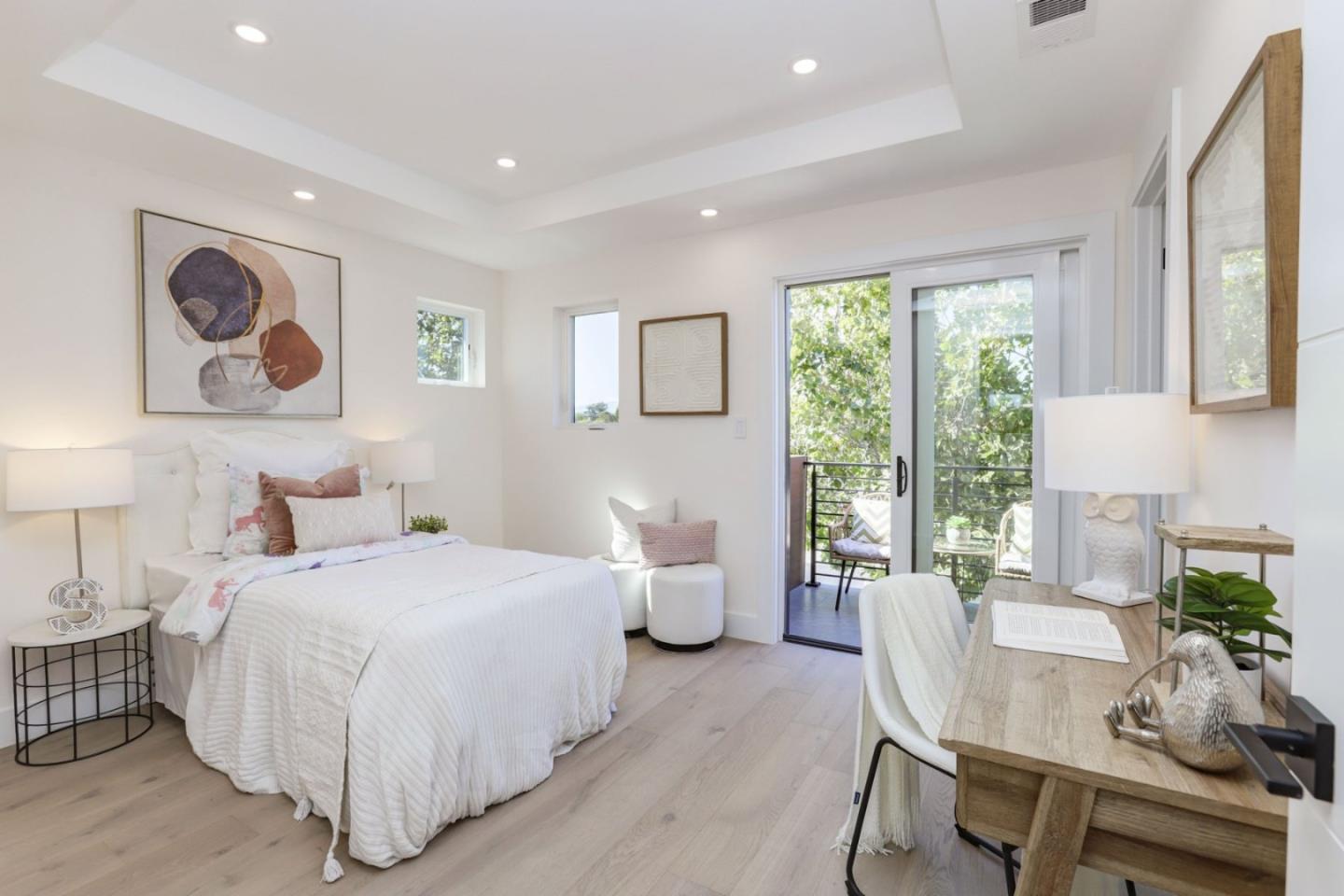 3107 Greer Road Palo Alto, CA 94303 - Photo 15 of 20 a bedroom with a bed and wooden floor