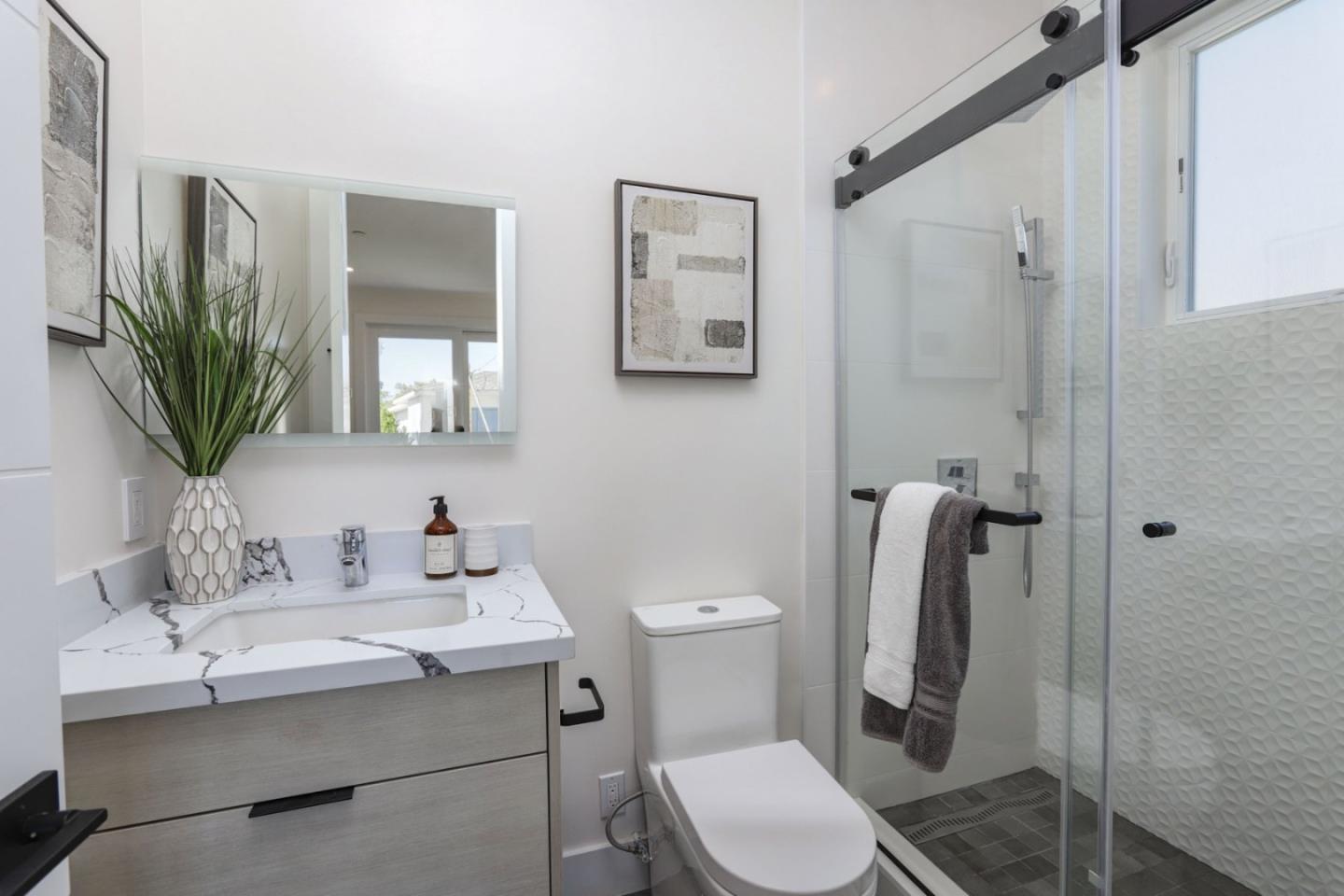 3107 Greer Road Palo Alto, CA 94303 - Photo 17 of 20 a bathroom with a sink toilet and shower