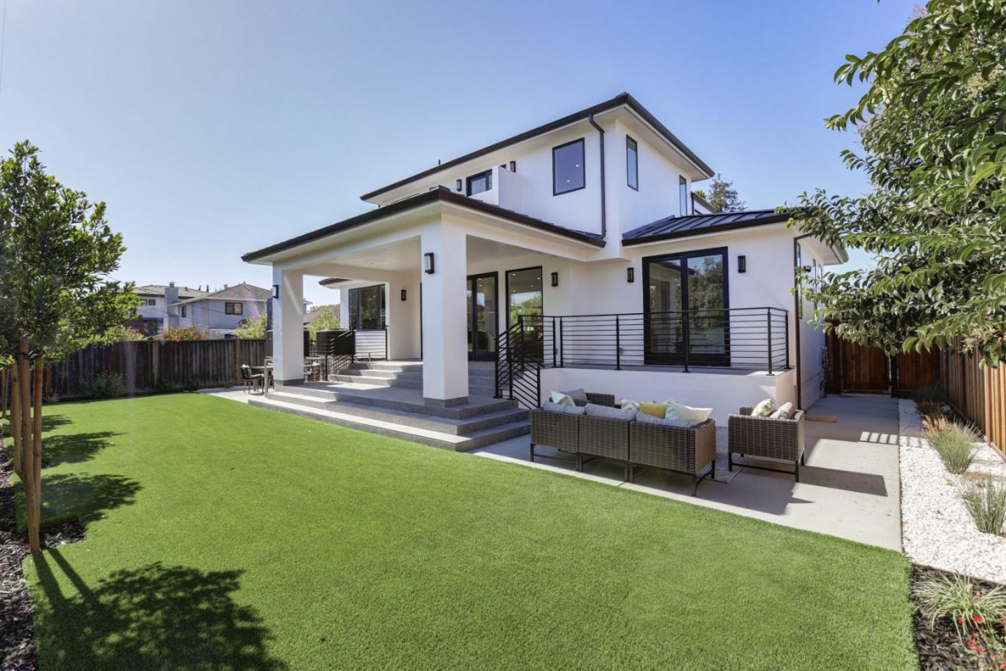3107 Greer Road Palo Alto, CA 94303 - Photo 19 of 20 a front view of house with a garden and patio