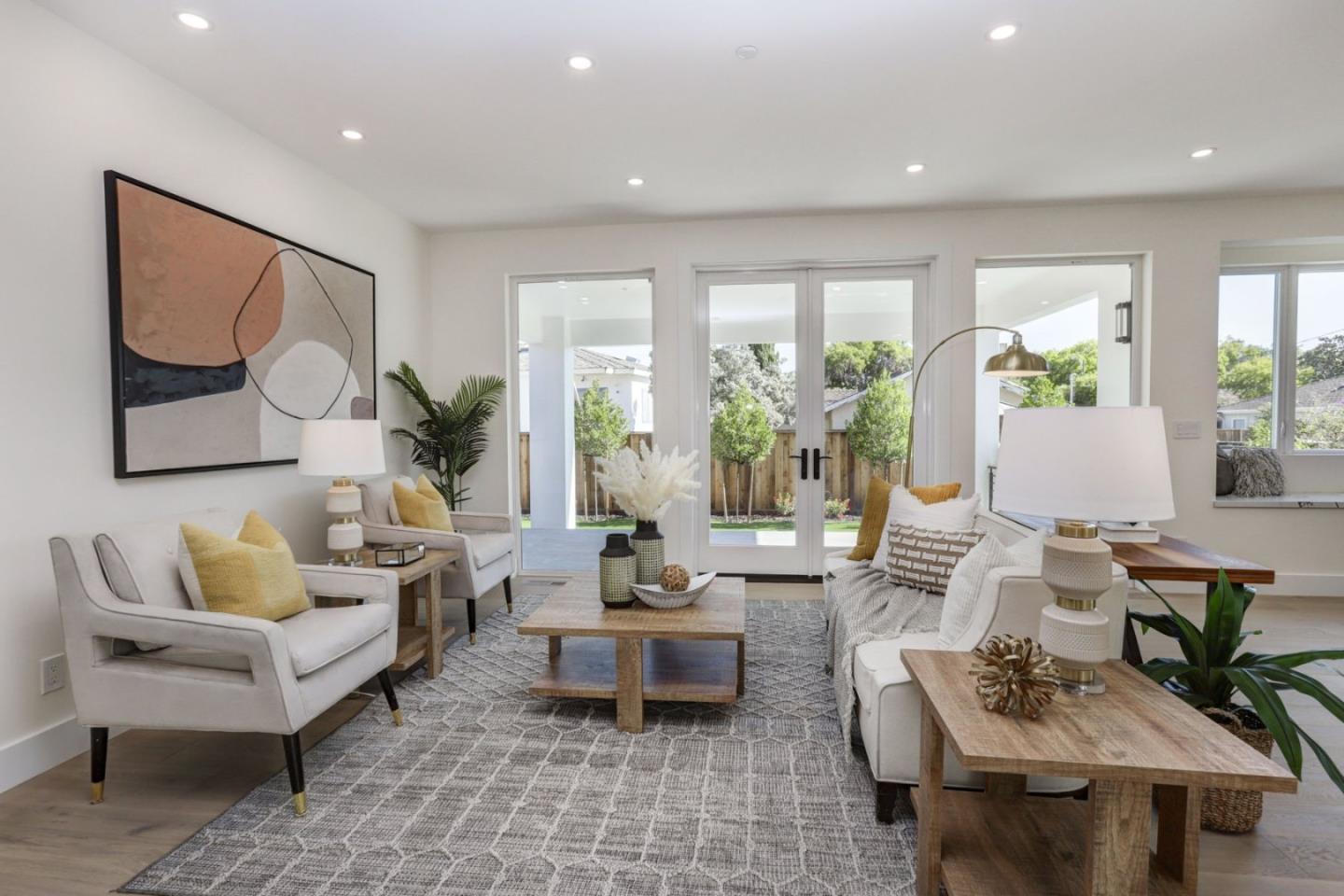 3107 Greer Road Palo Alto, CA 94303 - Photo 2 of 20 a living room with furniture and a large window