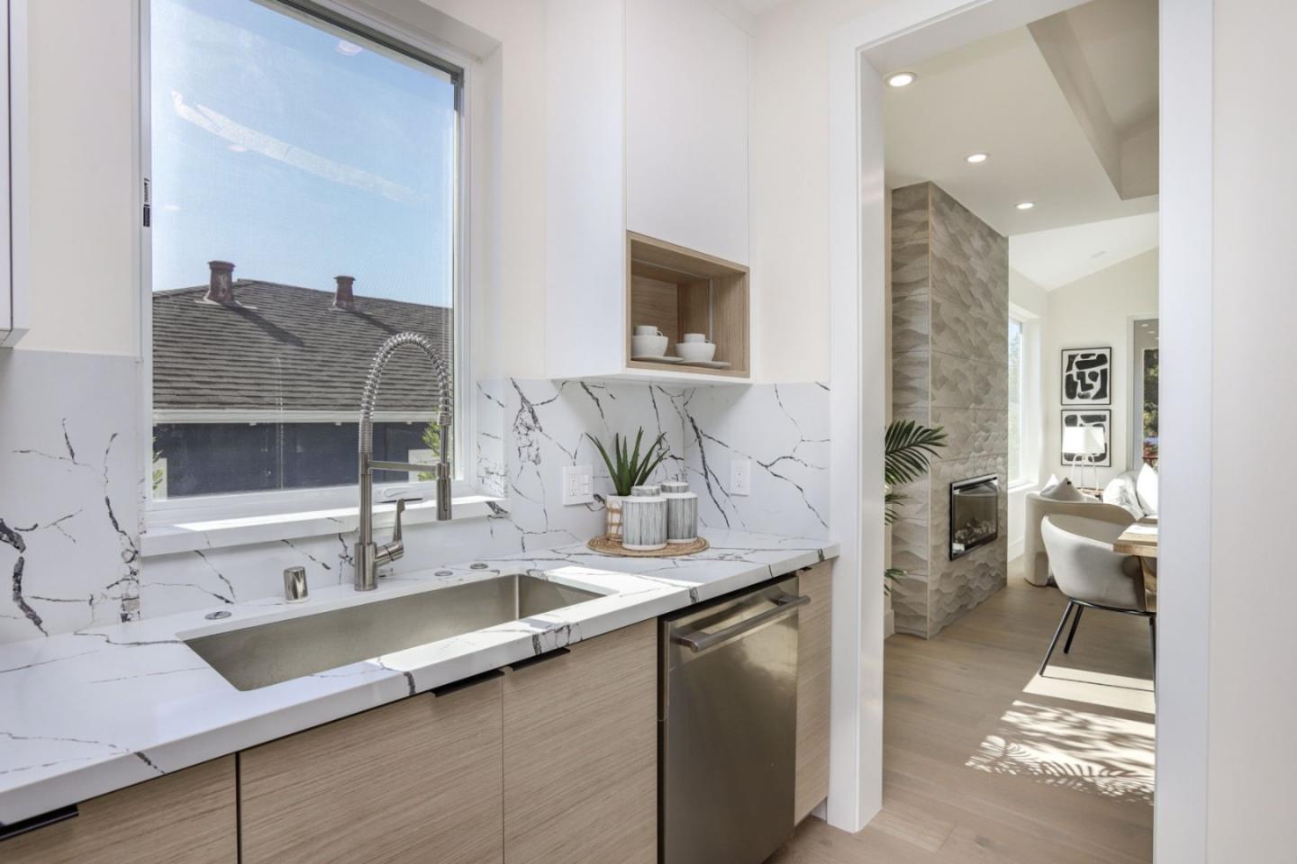 3107 Greer Road Palo Alto, CA 94303 - Photo 7 of 20 a bathroom with a sink and a mirror