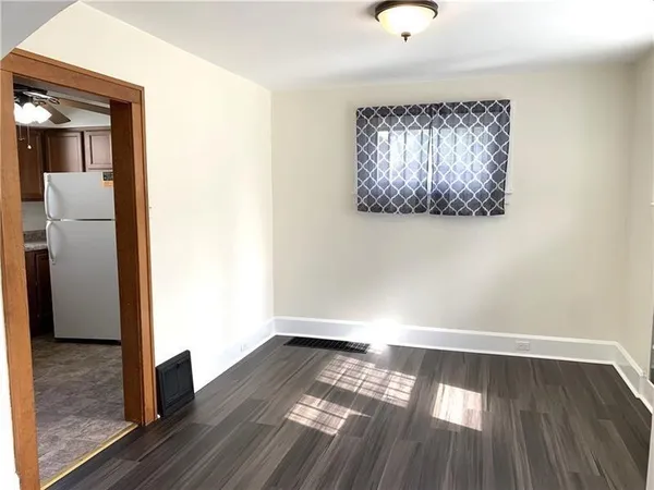a view of entryway with wooden floor