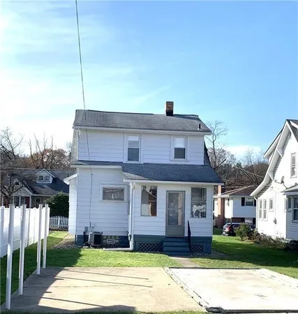 a house view with a garden space