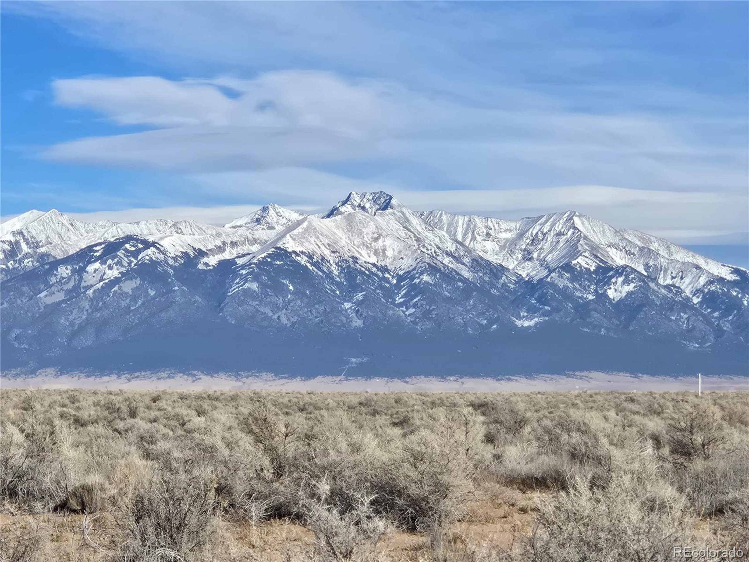 a view of mountain view with trees