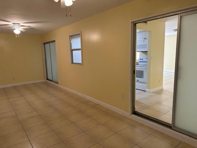 7013 Northwest 63rd Court Fort Lauderdale, FL 33321 - Photo 14 of 28 glassed back patio