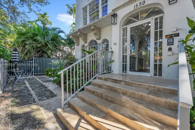 a view of a garden with a potted plant