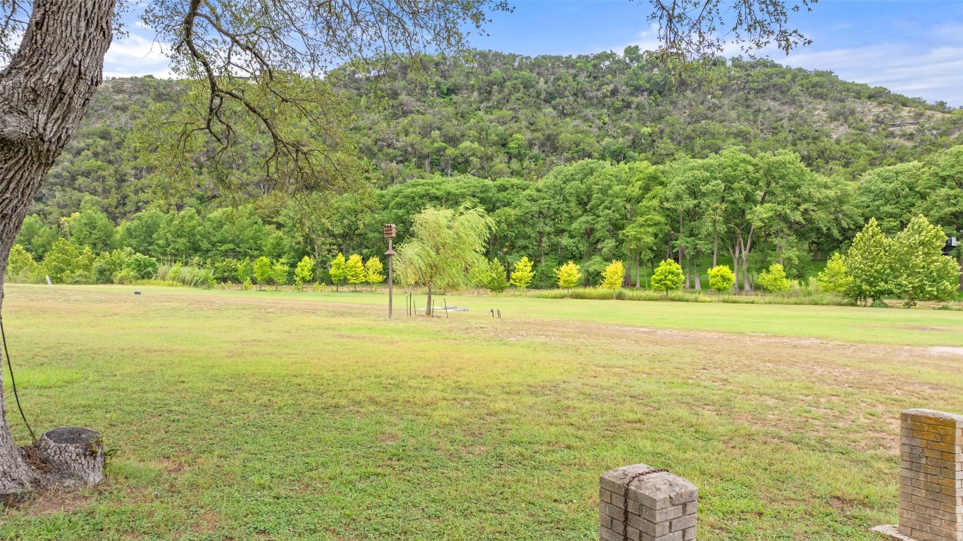200 Rim Road Wimberley, TX 78676 - Photo 3 of 25 Stunning waterfront lot on the Blanco River close to downtown Wimberley and next to community HOA park
