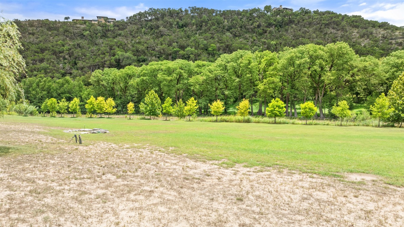 200 Rim Road Wimberley, TX 78676 - Photo 9 of 25 This lot is private and amazing hill views and trees along with ultimate waterfrontage.