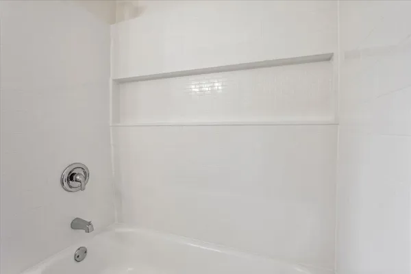 a bathroom with a bathtub