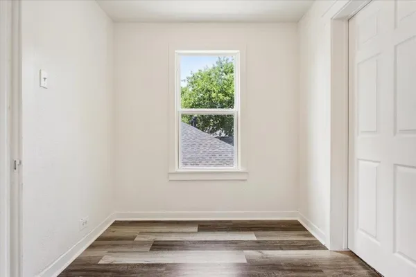 a view of a room that has a window in it