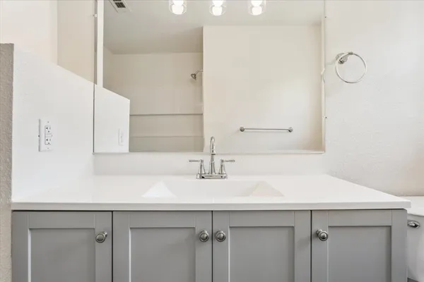 a sink with a mirror