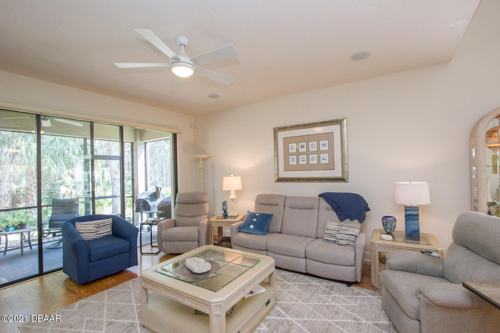 751 Cobblestone Way Ormond Beach, FL 32174 - Photo 21 of 63 a living room with furniture and a large window