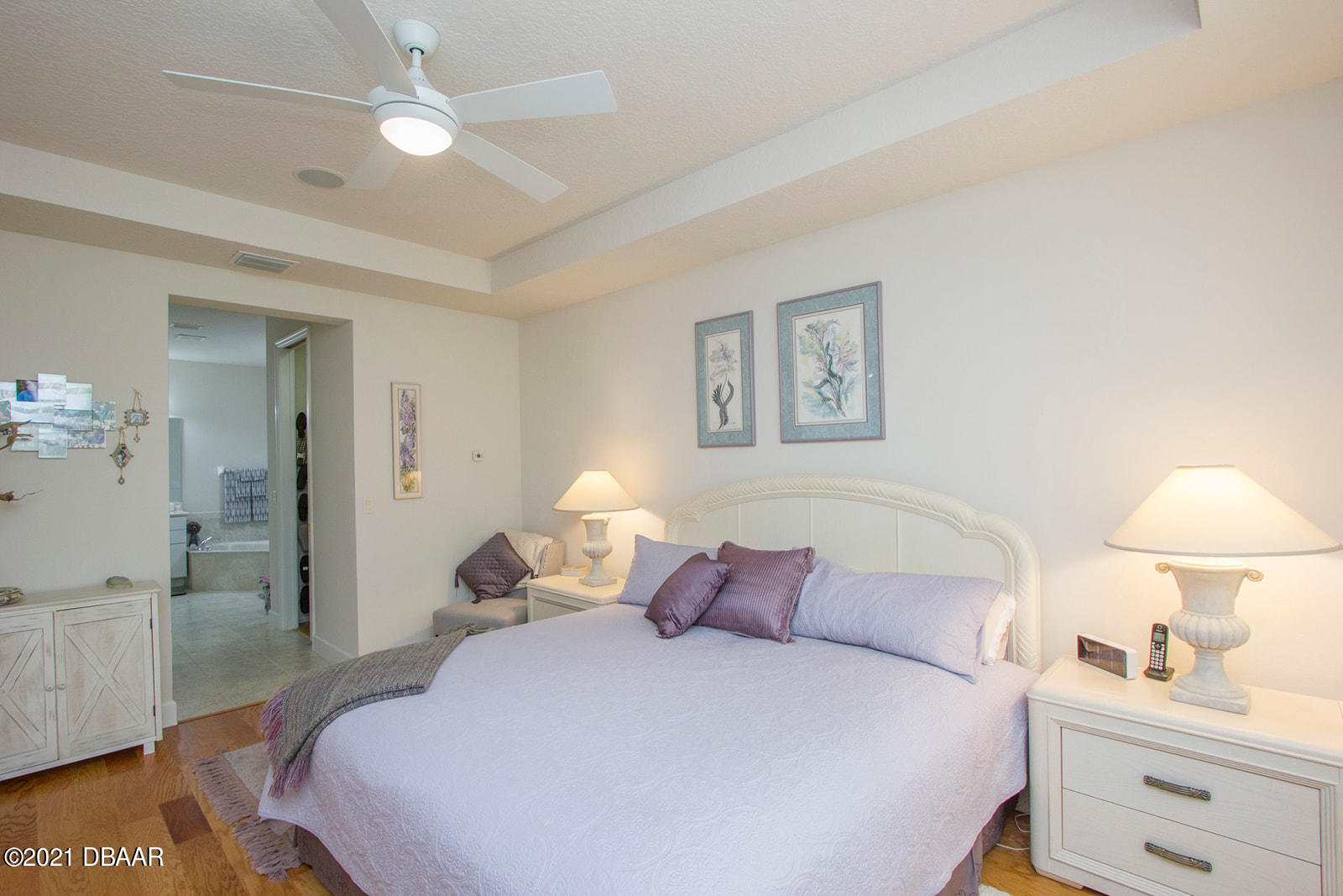751 Cobblestone Way Ormond Beach, FL 32174 - Photo 25 of 63 a bedroom with a bed and a lamp