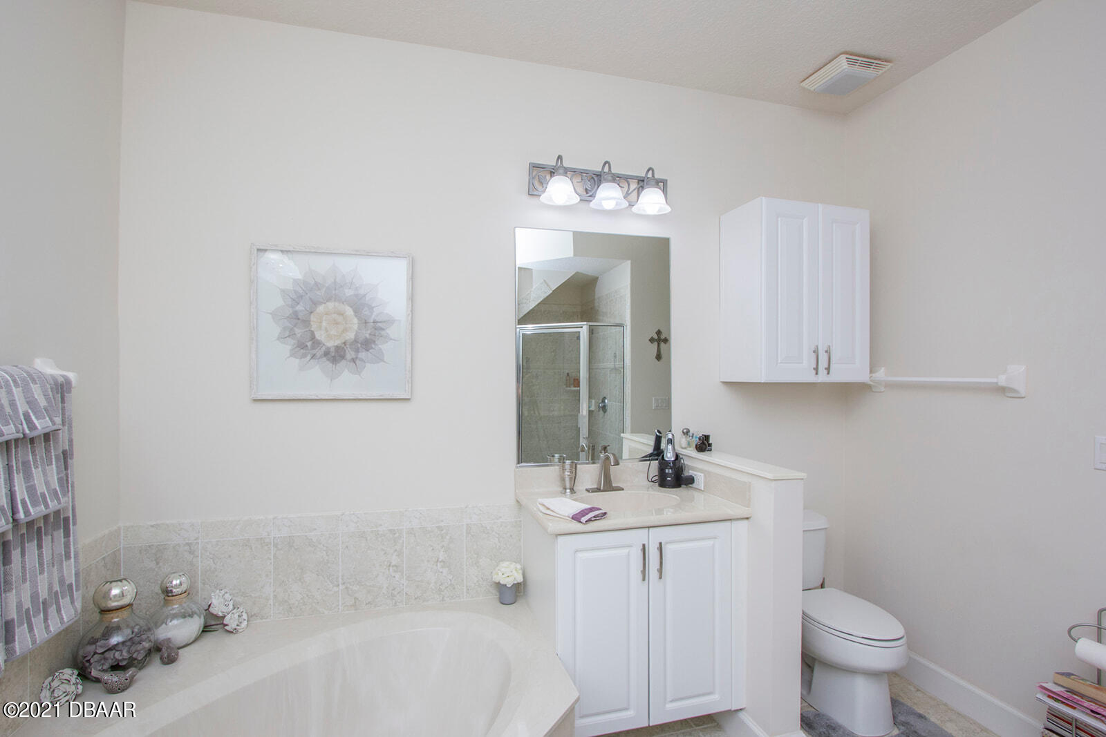 751 Cobblestone Way Ormond Beach, FL 32174 - Photo 29 of 63 a bathroom with a sink toilet and shower