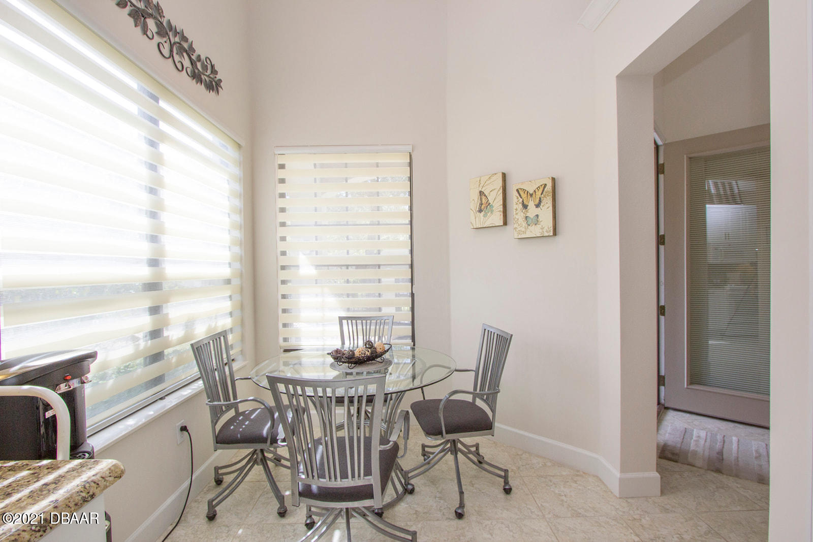 751 Cobblestone Way Ormond Beach, FL 32174 - Photo 3 of 63 a view of a dining room with furniture window and outside view