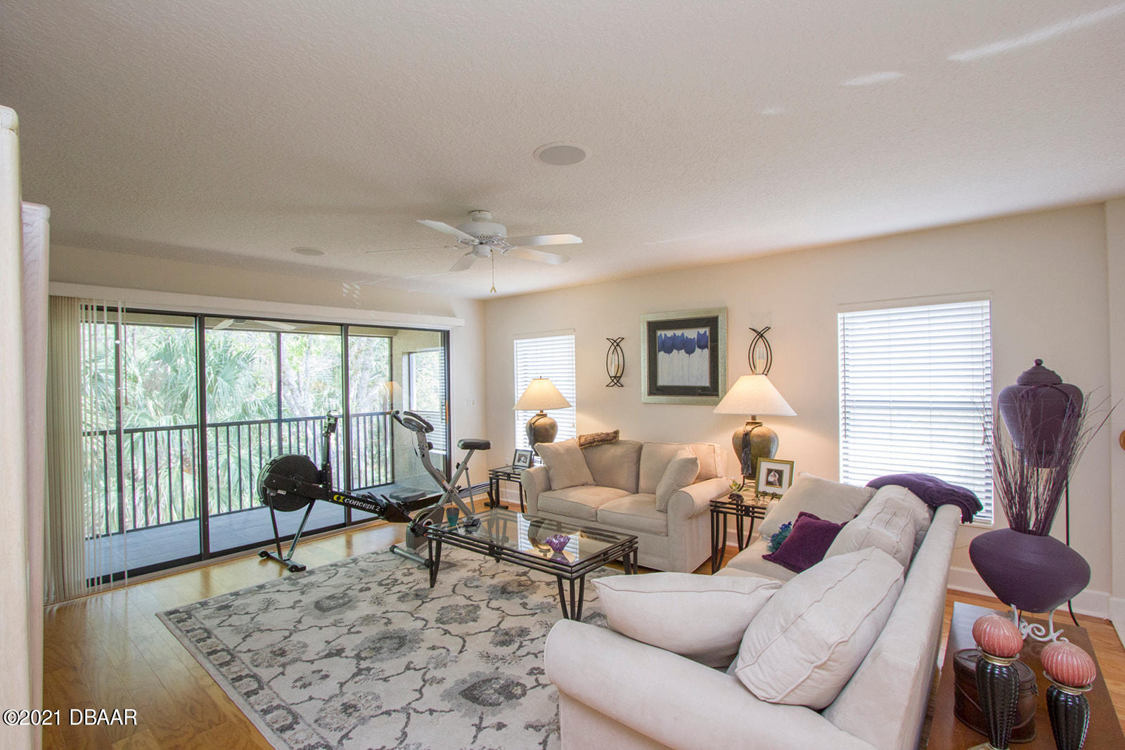 751 Cobblestone Way Ormond Beach, FL 32174 - Photo 33 of 63 a living room with furniture and a rug