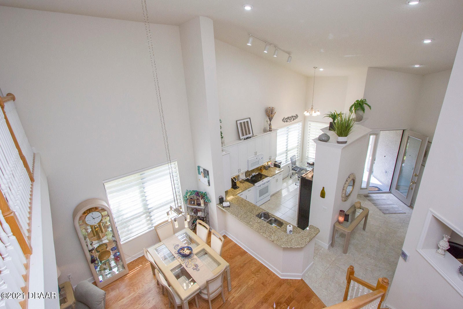751 Cobblestone Way Ormond Beach, FL 32174 - Photo 37 of 63 a living room with furniture and a table