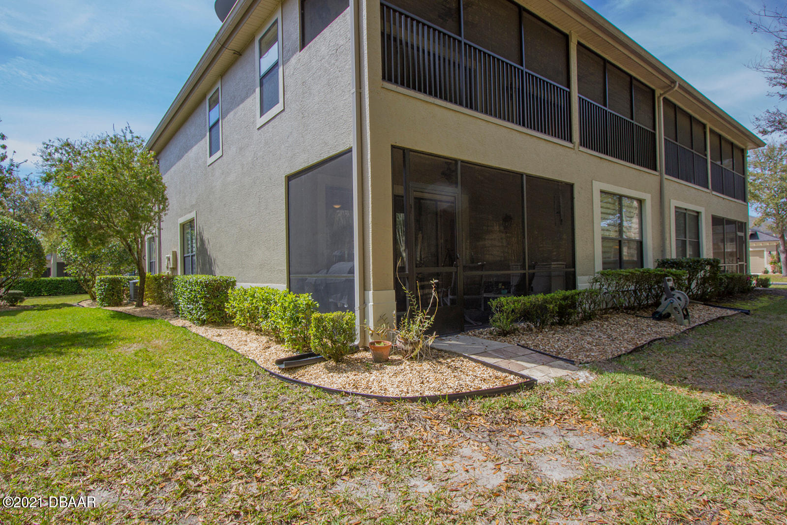 751 Cobblestone Way Ormond Beach, FL 32174 - Photo 52 of 63 a view of a house with backyard and sitting area