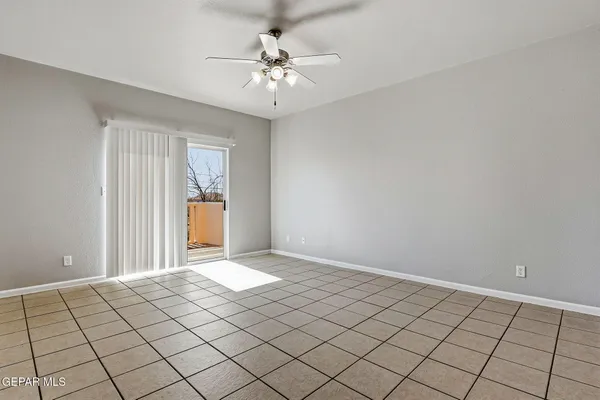 a view of an empty room and window