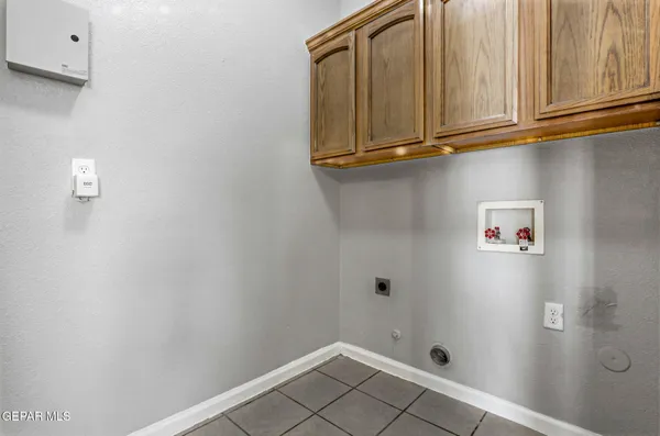 a view of storage and utility room with empty racks