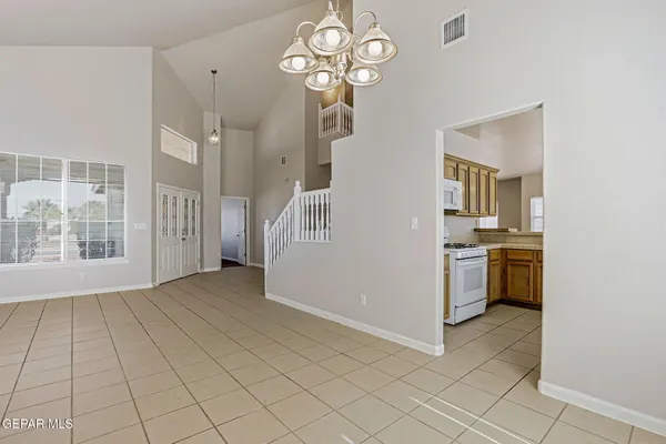 a view of a kitchen with a sink and dishwasher