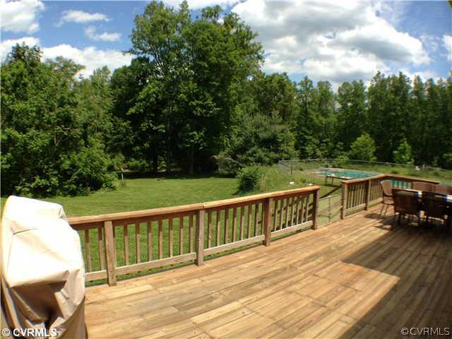 6144 Orchard Road New Kent, VA 23124 - Photo 14 of 22 Yard/Garden - Large rear deck over looking acreage