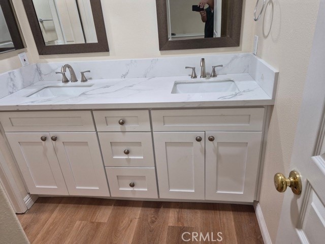 20 Altezza Irvine, CA 92606 - Photo 4 of 11 a bathroom with a sink and a mirror
