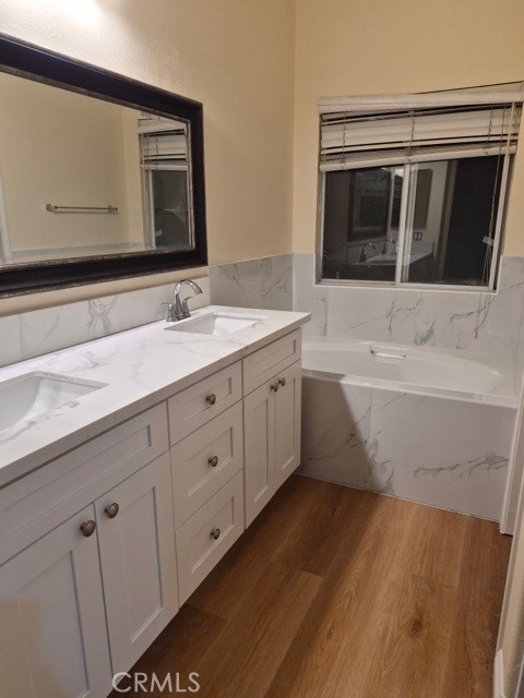 20 Altezza Irvine, CA 92606 - Photo 6 of 11 a bathroom with a sink and a mirror