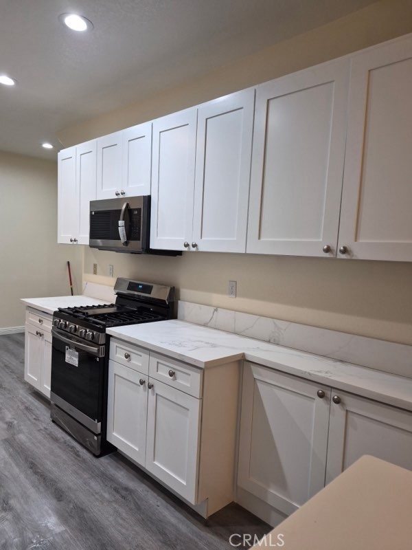 20 Altezza Irvine, CA 92606 - Photo 10 of 11 a kitchen with cabinets appliances and a sink