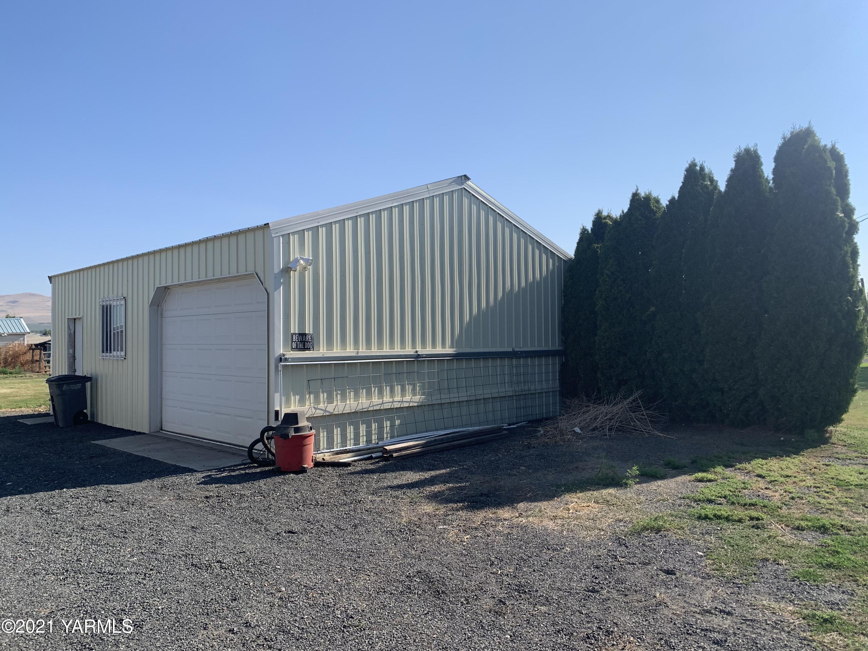 6807 Bell Road Yakima, WA 98901 - Photo 12 of 13 a view of a house with a yard