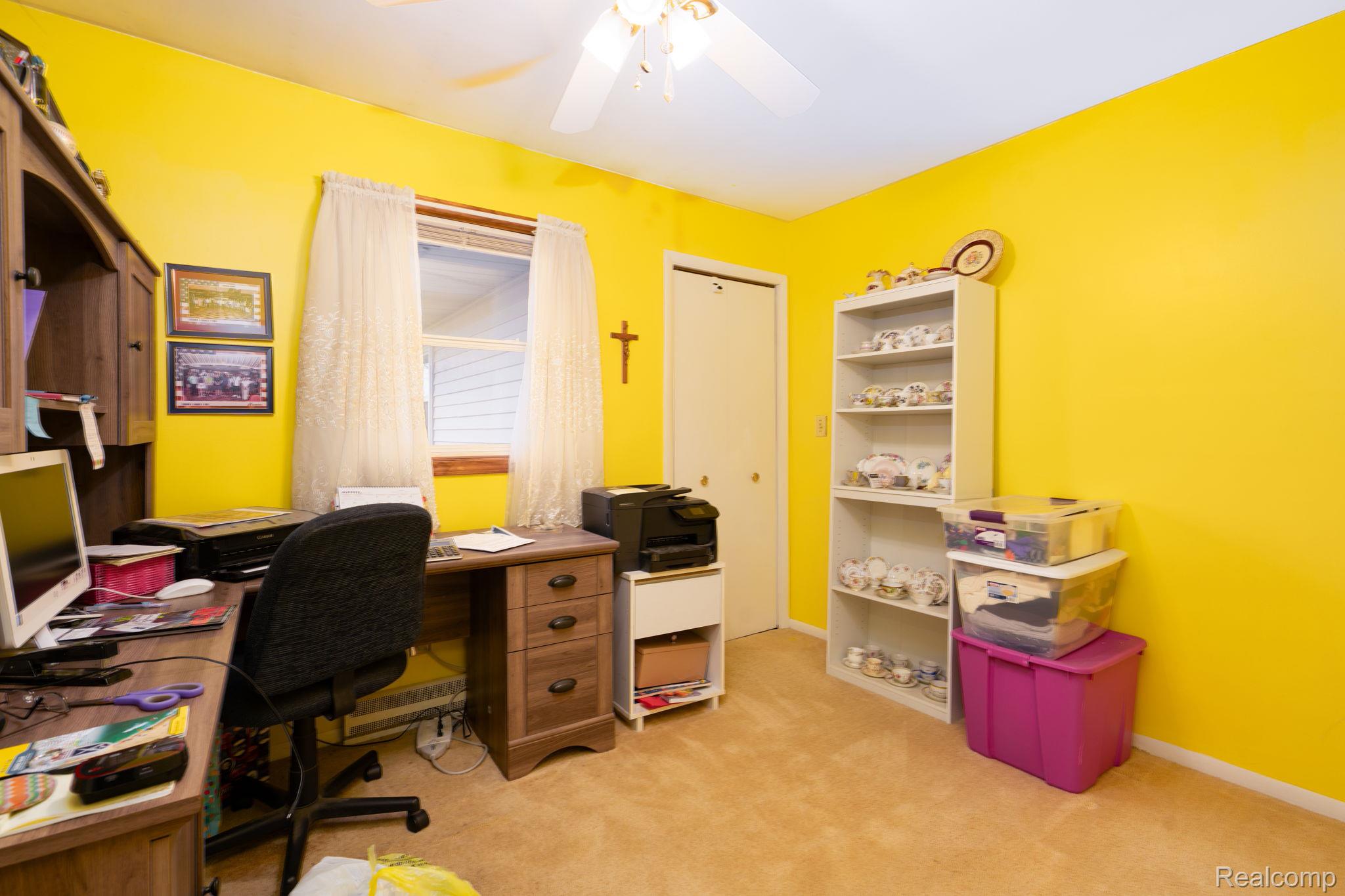 2890 Graham Road Imlay City, MI 48444 - Photo 23 of 33 Office with light colored carpet and a ceiling fan