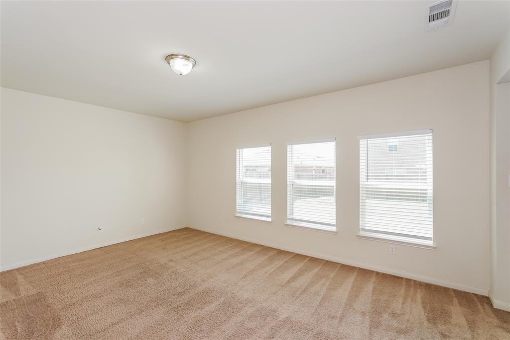 113 Rebel Road Venus, TX 76084 - Photo 4 of 17 an empty room with a window