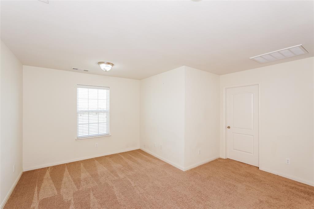 113 Rebel Road Venus, TX 76084 - Photo 8 of 17 an empty room with windows