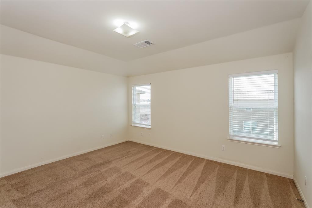 113 Rebel Road Venus, TX 76084 - Photo 9 of 17 a view of an empty room with a window